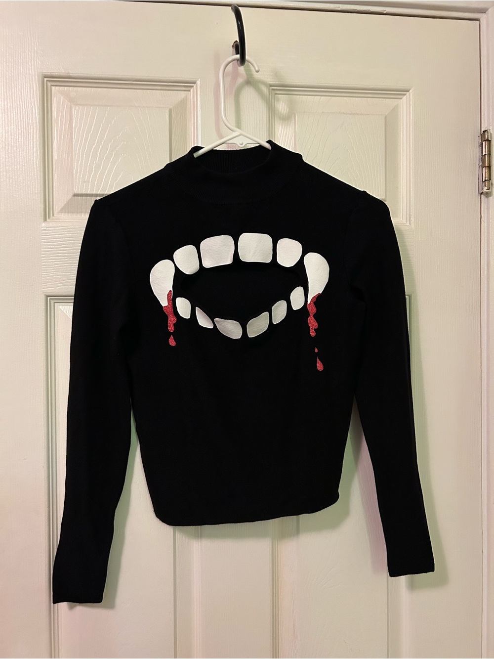 H&M Divided Black Long Sleeve Tee with White Vampire Teeth and Red Drip Detail